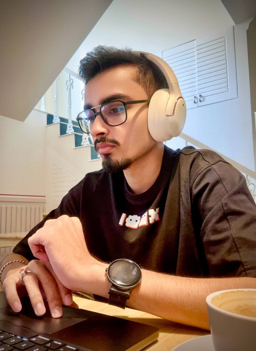 Dheeraj, founder of Hyvon Labs, working at a laptop